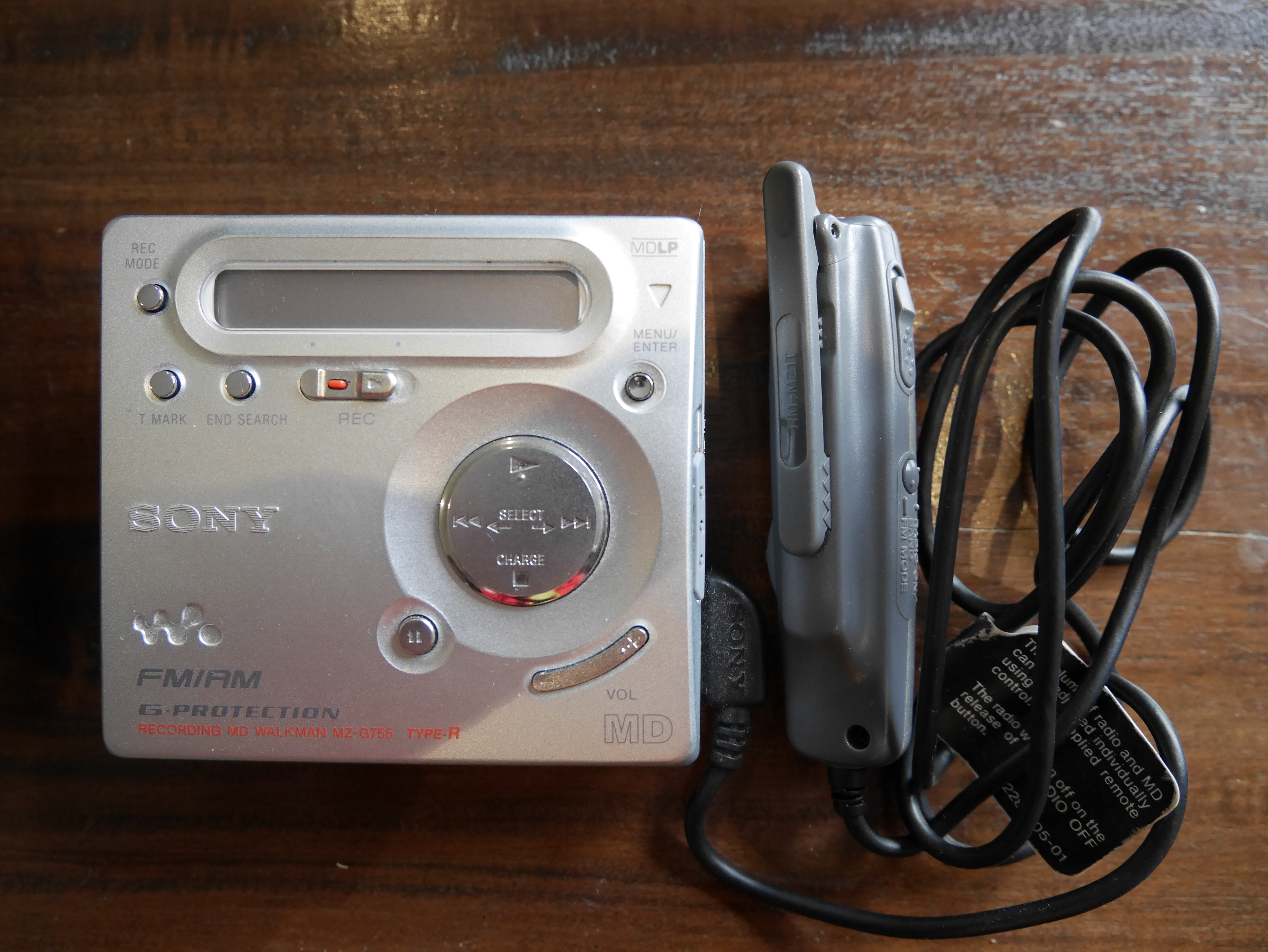 FS: Sony Recordable Minidisc/Tuner Walkman + Discs - Stereo, Home