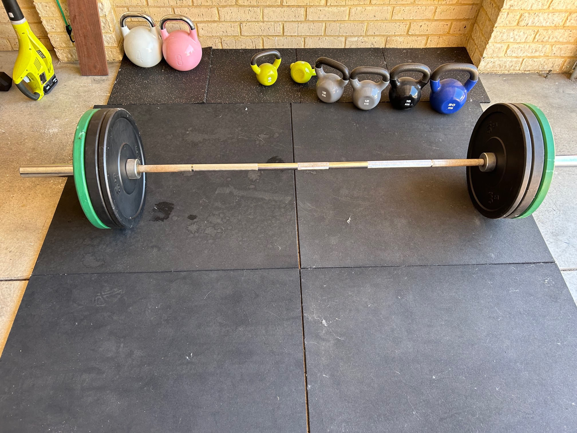 SOLD ELSEWHERE SOLD GYM EQUIPMENT BAR RUBBER BUMP PLATES RACK